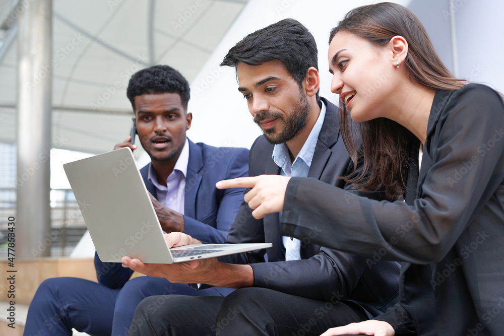 young confidence business teamwork sitting and working on laptop outside building young confidence business teamwork sitting and working on laptop outside building