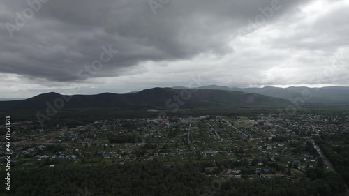 Aerial aerial view of a small village in a wooded area