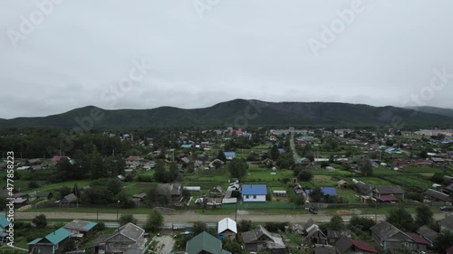 Aerial aerial view of a small village in a wooded area