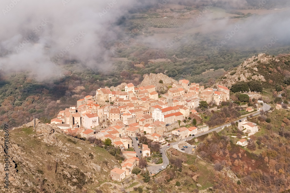 Cloud hanging over the ancient mountain village of Speloncato in the Balagne region of Corsica