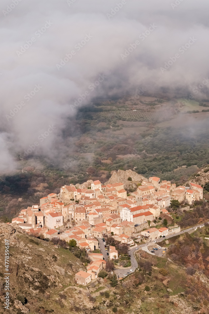 Cloud hanging over the ancient mountain village of Speloncato in the Balagne region of Corsica