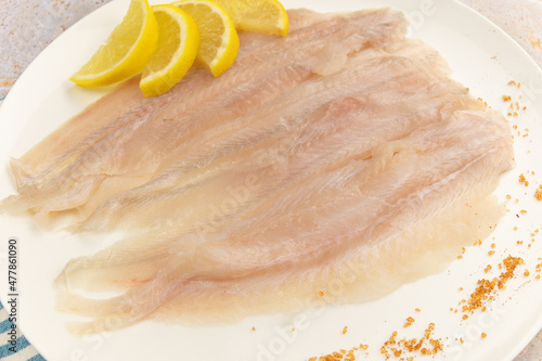 Obraz na plátne raw flounder fillet in a plate