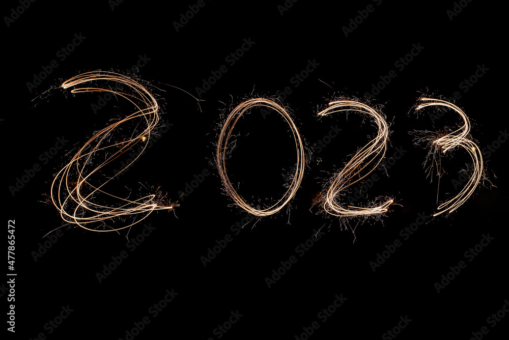 New Year 2023 light. Sparklers draw figures 2023. New Year 2023 light. Sparklers draw figures 2023.