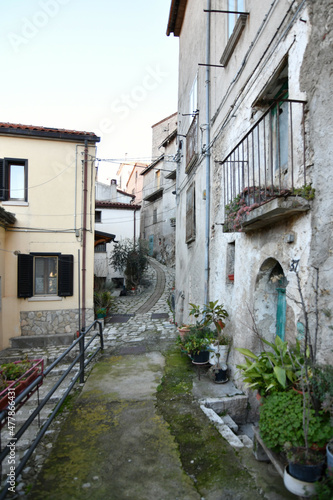 A small street between the old houses of Savoia di Lucania, a small town in the province of Potenza in Basilicata, Italy. 