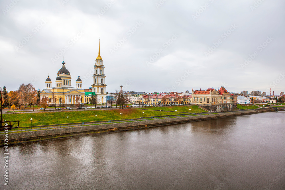 The visiting card of the city. Volga, Volzhskaya embankment, Transfiguration Cathedral and the building of the new grain exchange. Rybinsk. Yaroslavskaya oblast. Russia The visiting card of the city. Volga, Volzhskaya embankment, Transfiguration Cathedral and the building of the new grain exchange. Rybinsk. Yaroslavskaya oblast. Russia