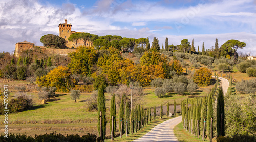 Typical view in Tuscany with cypress trees and beautiful country estates - travel photography
