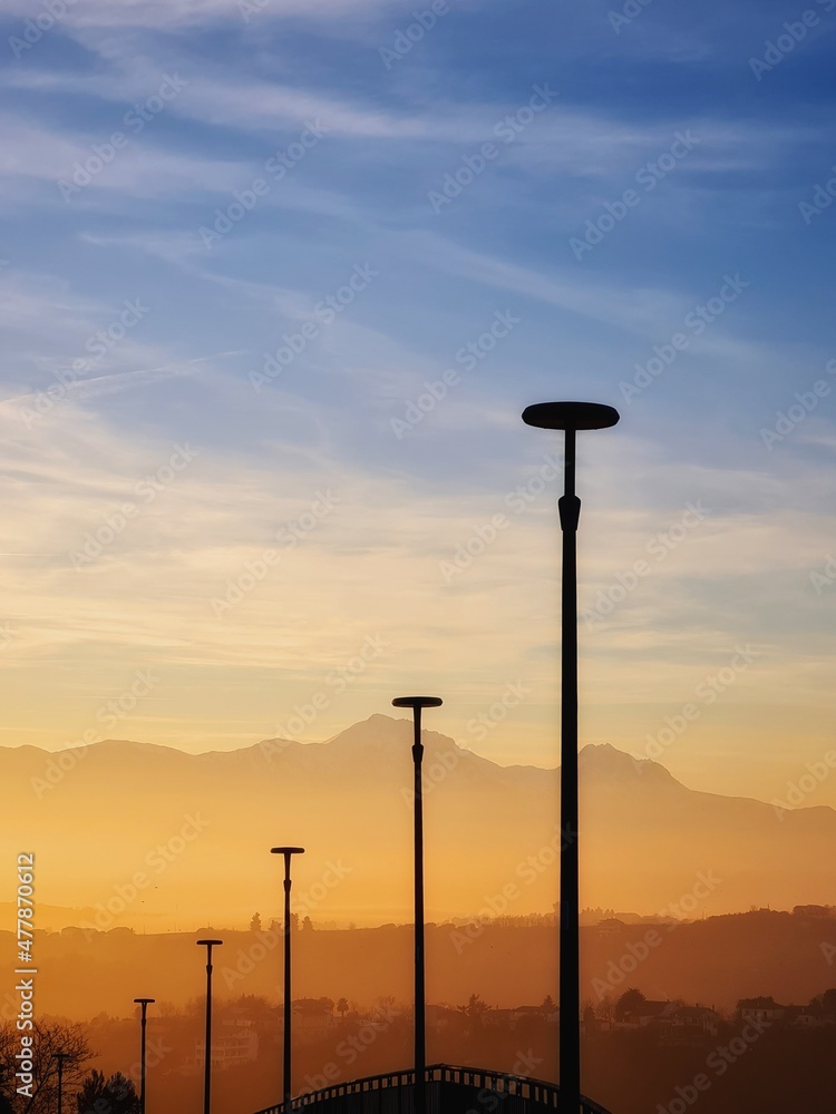 view with mist and sunlight of the Gran Sasso mountains in Abruzzo, Italy