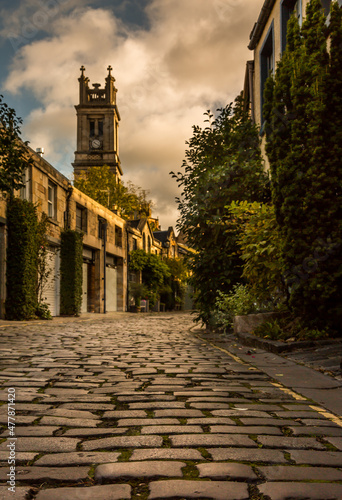 The beautiful picturesque cobbled street of Circus Lane, only a couple of minutes walk away from Edinburgh City center, Scotland photo