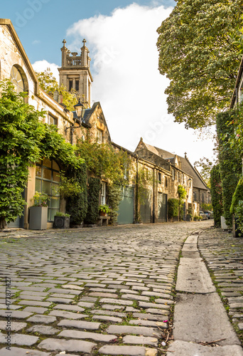 The beautiful picturesque cobbled street of Circus Lane, only a couple of minutes walk away from Edinburgh City center, Scotland photo