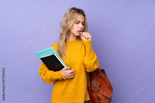 Teenager Russian student girl isolated on purple background is suffering with cough and feeling bad