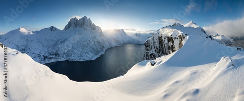 Fotografering Polar night, Senja panoramic view landscape nordic snow cold winter norway ocean cloudy sky snowy mountains