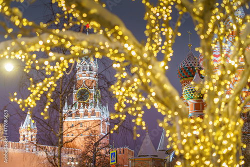 view of the Kremlin and the Spasskaya tower through the Christmas illumination, Moscow, Russia © Sergey Bogomyako