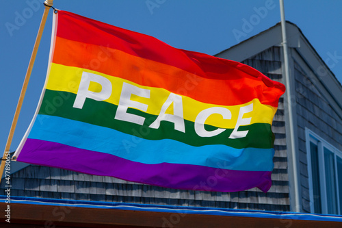 Gay Pride Flag with the Word PEACE