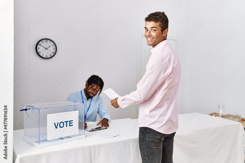 Obraz premium Two men smiling confident voting at electoral college