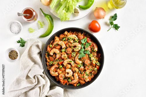 Creole jambalaya with chicken, smoked sausages and vegetables photo