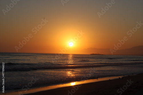 sunset ocean and bridge