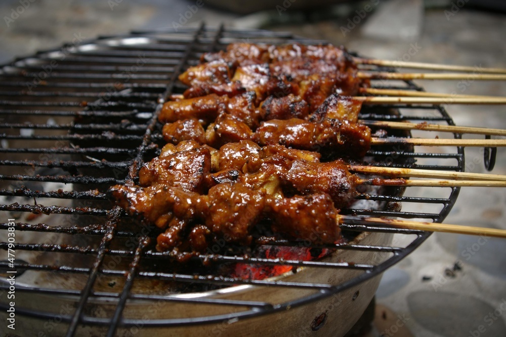 sate or satay is one of the typical Indonesian food. This food is made from chicken, beef or mutton, the cooking method is grilled over coals, seasoned with peanut sauce and soy sauce.