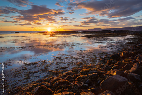 Beautiful sunset with reflection in Selvogur  south Iceland