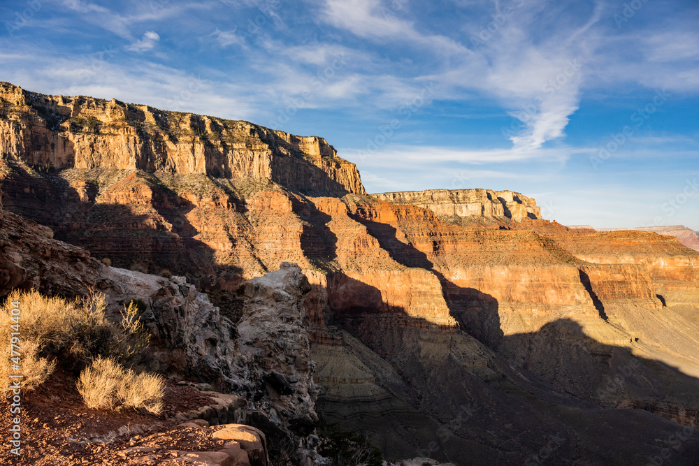 Blue Cloudy Sky Over Contrasting Shadows In The Grand Canyon