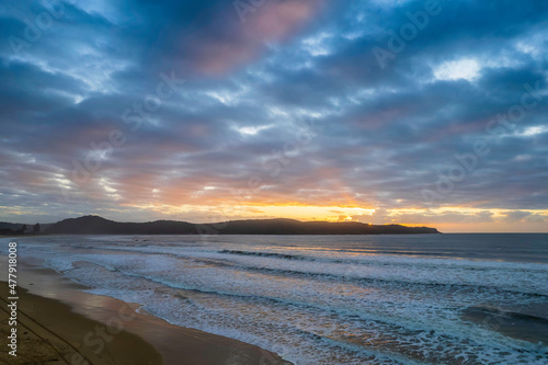 Cloudy aerial sunrise seascape