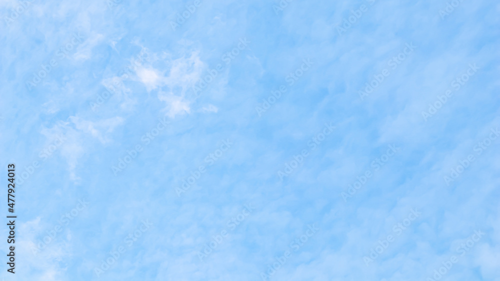 Background of blue sky with white clouds