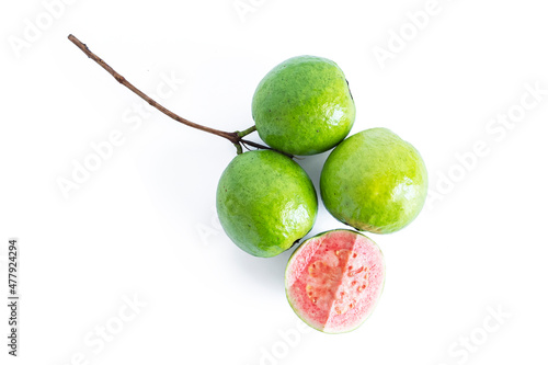 Common guava fruit cut isolated on white background photo