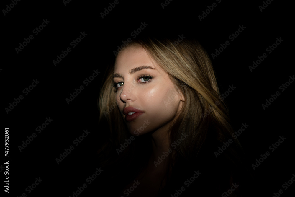 Sexy alluring woman, sensual young model looking seduce on black studio. Fashion portrait of elegant woman in shadow, glamor light. Beauty close up face of beautiful pretty girl on black. Sexy alluring woman, sensual young model looking seduce on black studio. Fashion portrait of elegant woman in shadow, glamor light. Beauty close up face of beautiful pretty girl on black.