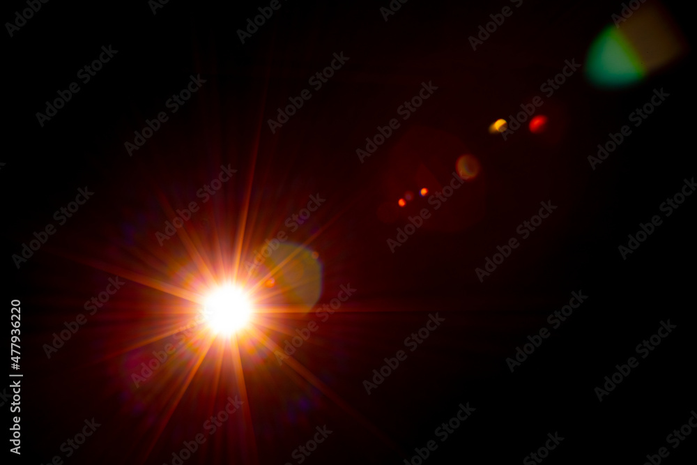 Fototapeta premium Sun flare on the black background