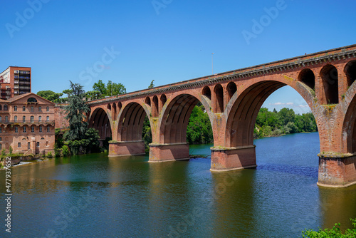 Albi old red brick stone bridge over Tarn river in France