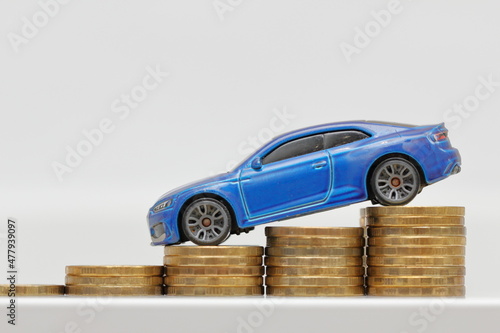 car and coins © pavelpuzzle
