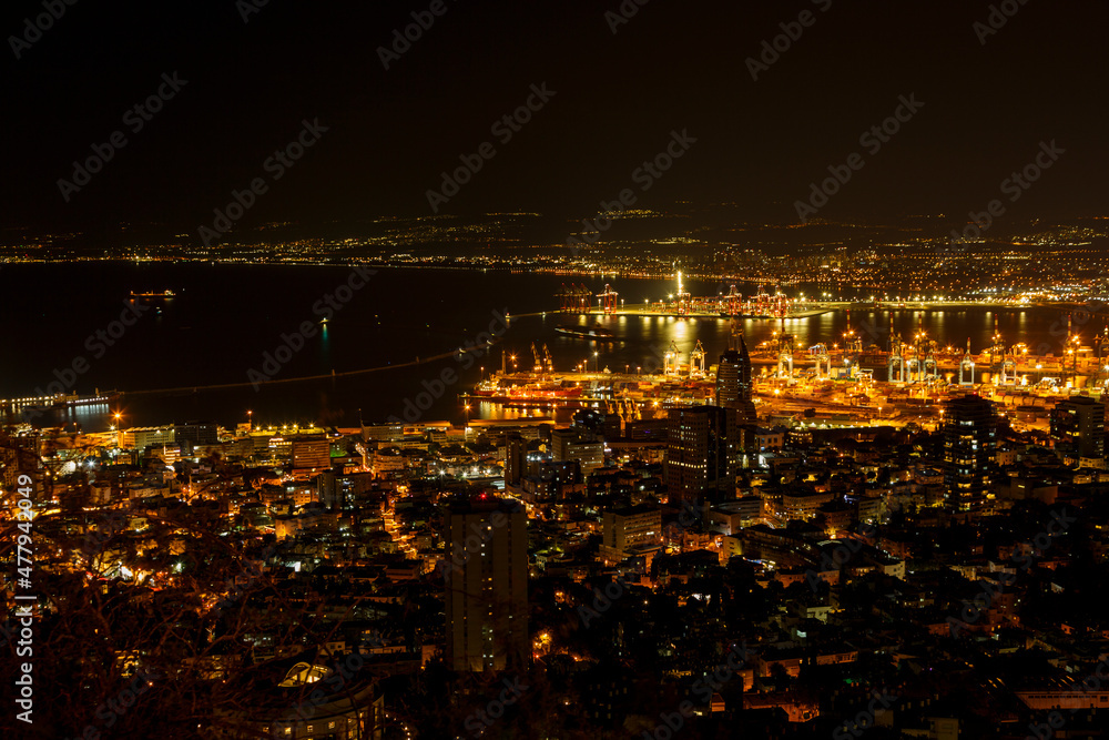 Night city landscape on the outskirts of the sea