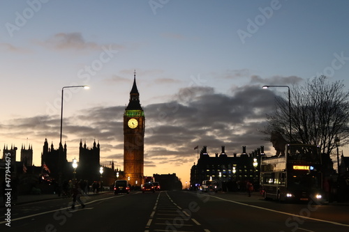 The Westminster Palace and Big Ben clock tower  major tourist attraction and Parliament in London just after sunset.