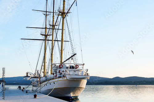 White sailing yacht is moored off the coast of Tivat. Montenegro