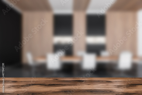 Table for product display with blurred meeting room on background