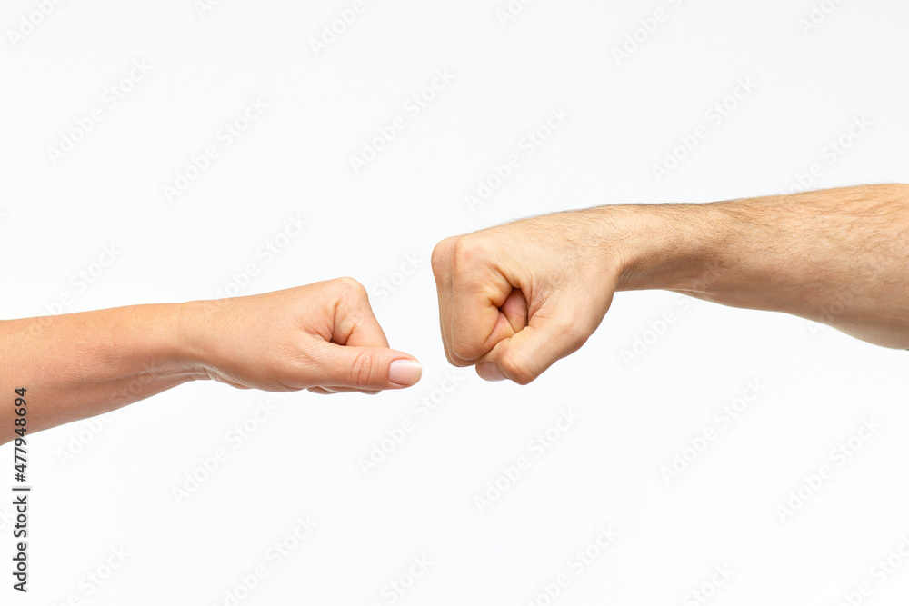 hands of a man and a woman hands reaching towards each other on a white background. Friendship and respect concept hands of a man and a woman hands reaching towards each other on a white background. Friendship and respect concept
