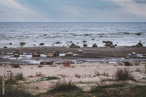 Baltic sea beach in Riga gulf with huge granite boulders