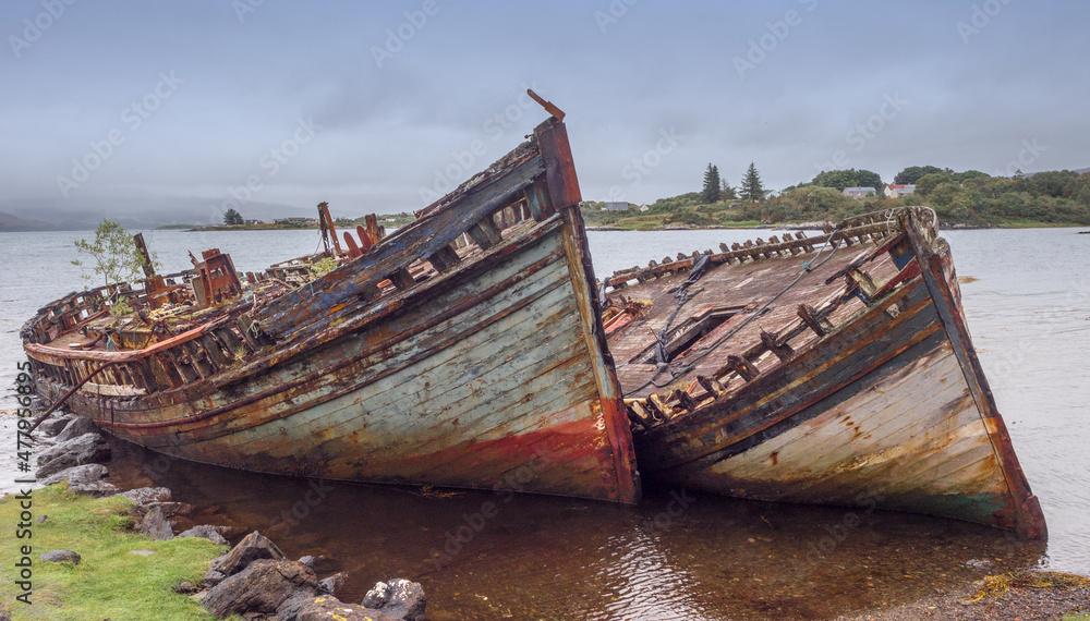 Old wrecked fishing boats at Salen beach, Isle of Mull, Scotland, uk