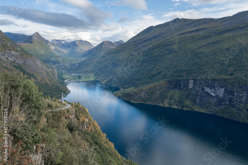 Late autumn afternoon in the Geiranger Fjord in Norway. More og Romsdal county. Famous Norwegian landscape landmark. Viewpoint above Geiranger. photo