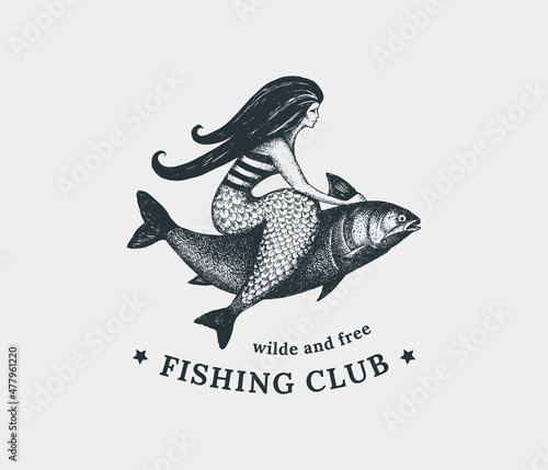 Silhouette of a mermaid riding a fish. Logo, trademark, design element in vintage style.
