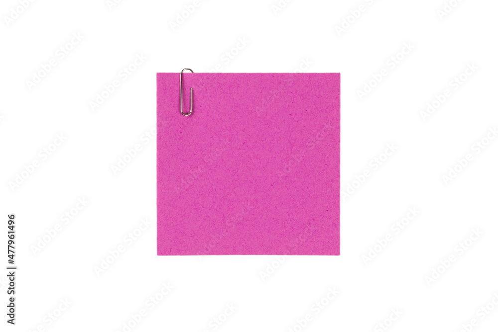 A sticker and a paper clip isolated on a white background A sticker and a paper clip isolated on a white background