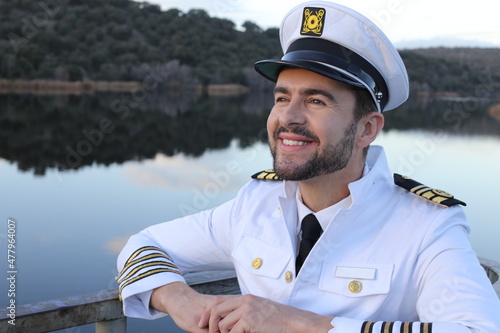 Ship captain with elegant uniform photo