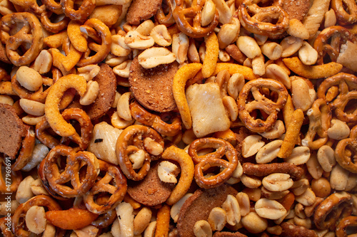 Obraz na plátně natural healthy trail mix snacks food display nuts peanuts pretzels corn sticks