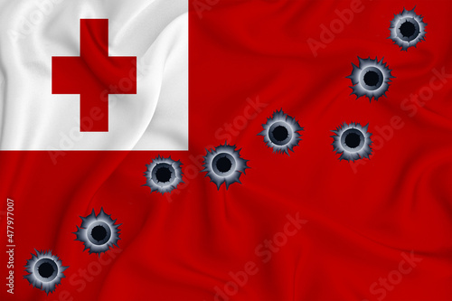 Tonga flag Close-up shot on waving background texture with bullet holes. The concept of design solutions. 3d rendering