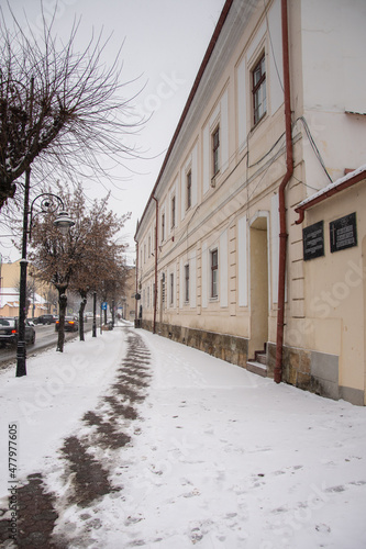 salt on the sidewalk to melt the snow  in December 2021, Bistrita, Romania  © Laurenx