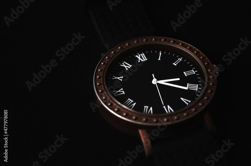Men's wristwatches on a dark background. Stock photo with a place for the inscription