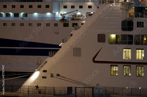 Luxury cruiseship cruise ship liner yacht Europa 2 in port of Palermo, Sicily Italy during twilight blue hour sunset dusk dawn photo