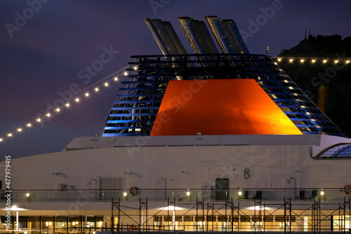 Luxury cruiseship cruise ship liner yacht Europa 2 in port of Palermo, Sicily Italy during twilight blue hour sunset dusk dawn photo