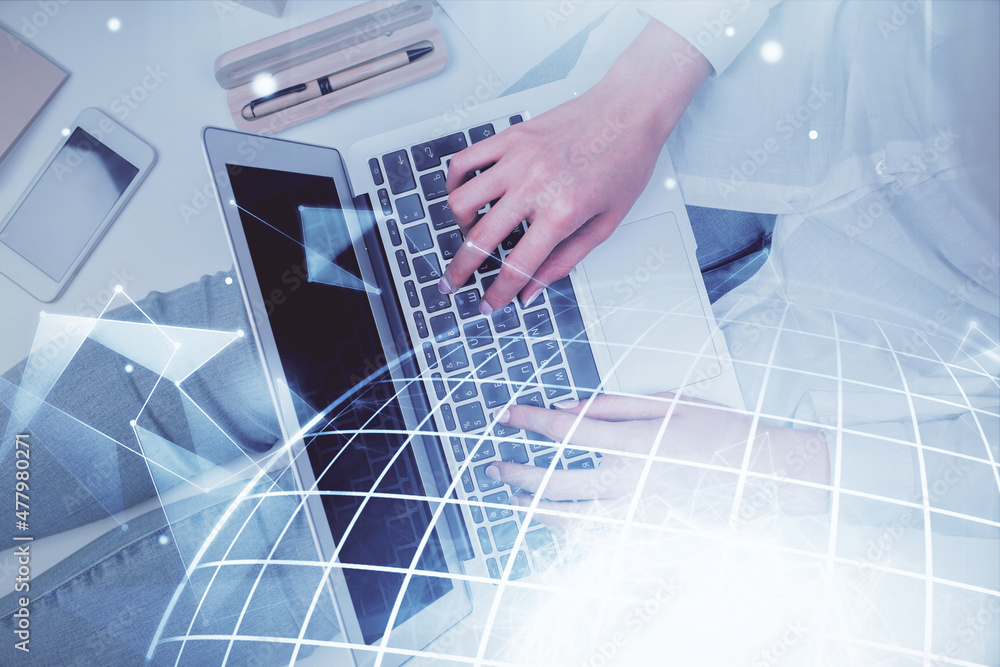 Double exposure of woman hands working on computer and world map hologram drawing. Top View. International business concept. Double exposure of woman hands working on computer and world map hologram drawing. Top View. International business concept.