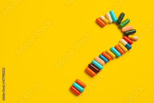 Question mark made of capsu...