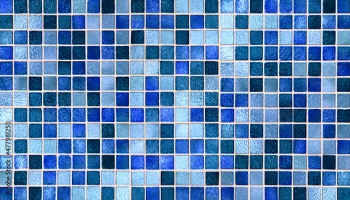 Colorful square mosaic pattern of small square glazed tiles in bright cobalt blue green teal emerald aqua turquoise hues